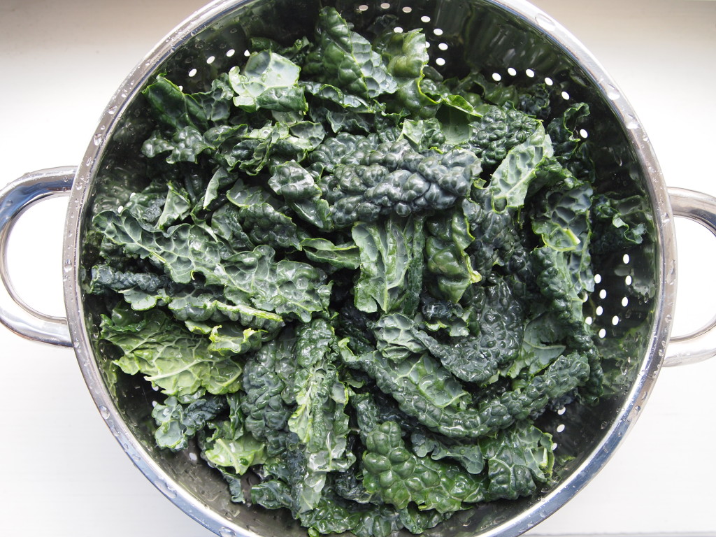 Washed kale in a strainer